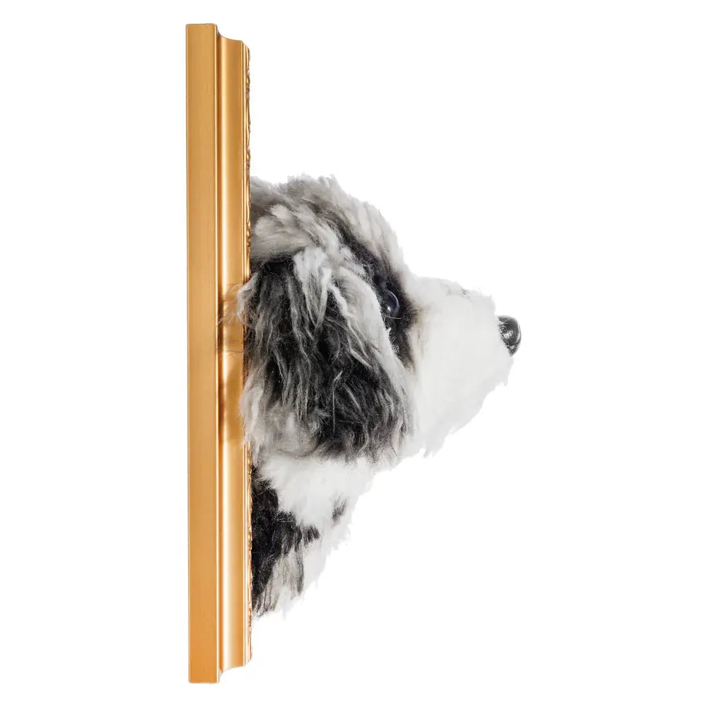 Side view of a custom 3D plush dog portrait by Paw-Pixie, mounted in a golden frame for a lifelike display.